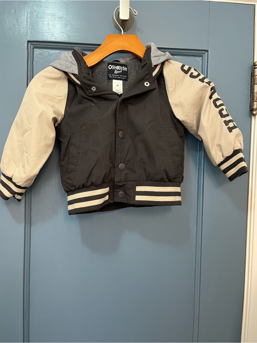 OshKosh B'gosh Black and Cream Hooded Bomber Jacket with Striped Trim